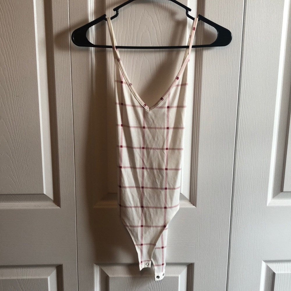 Red and white plaid bodysuit, V cut in the front.
